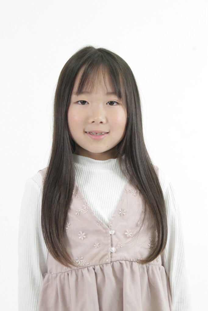 岸 真優子